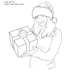 Girl in Santa hat holding a Christmas gift Girl in Santa hat holding a Christmas gift